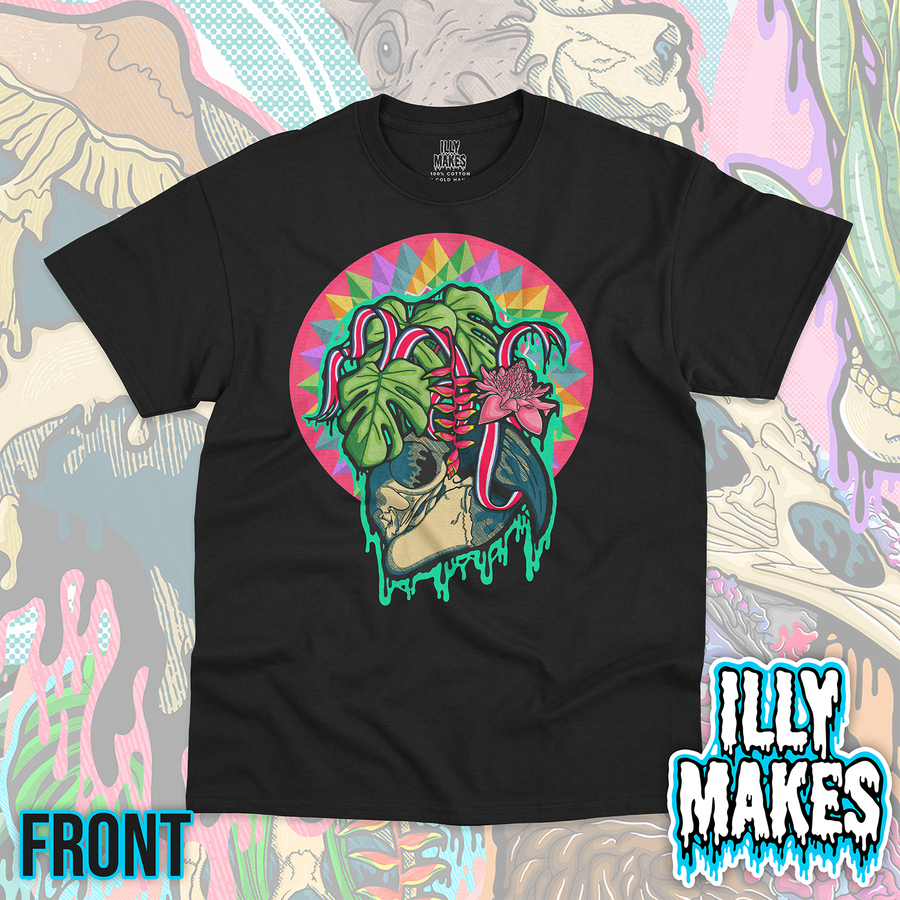 Black unisex tee featuring the Drippy Costa Rican Macaw Skull design by Illymakes, with a skull, tropical leaves, bright floral accents, a colorful geometric circular background, and teal dripping details.