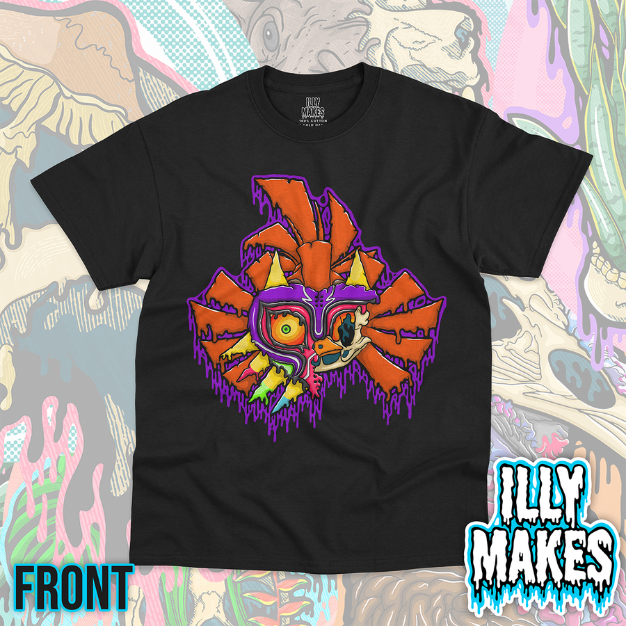 Black unisex tee featuring the Drippy Ancient Mask Skull design by Illymakes, with a colorful haunted mask, half skull detail, orange spikes, purple dripping accents, and bold dark fantasy styling.
