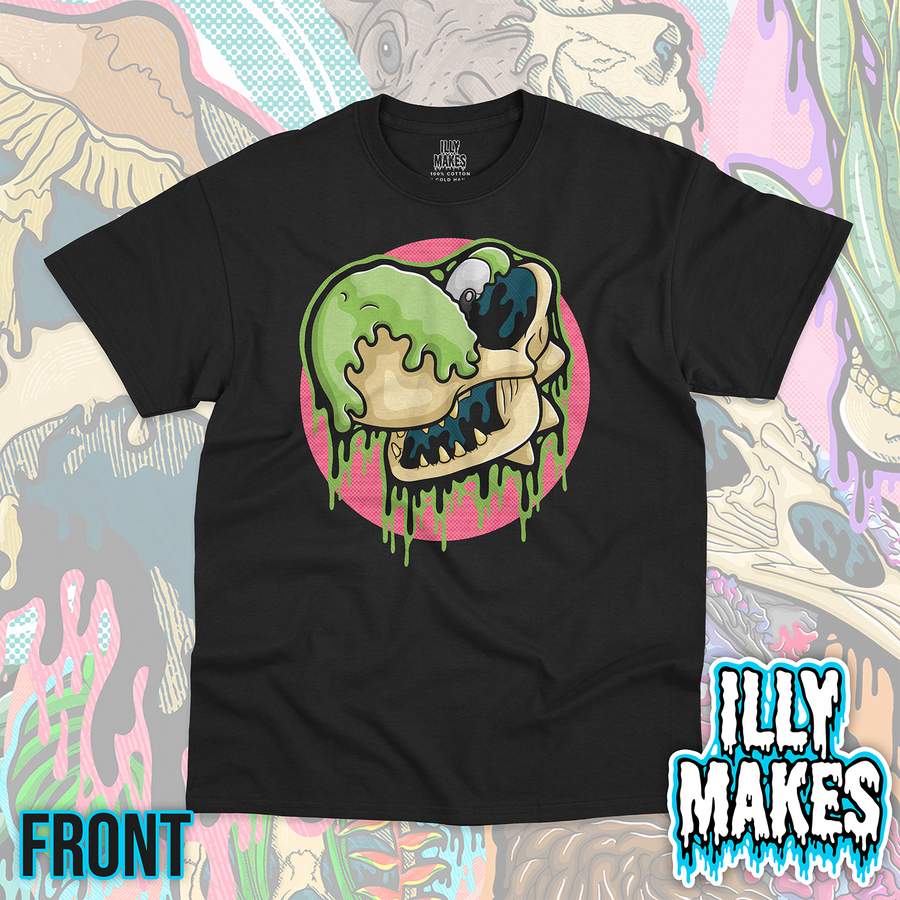 Black unisex tee featuring the Drippy Green Dino Skull design by Illymakes, with a green dinosaur-like face, cream skull details, green drips, and a pink circular background.